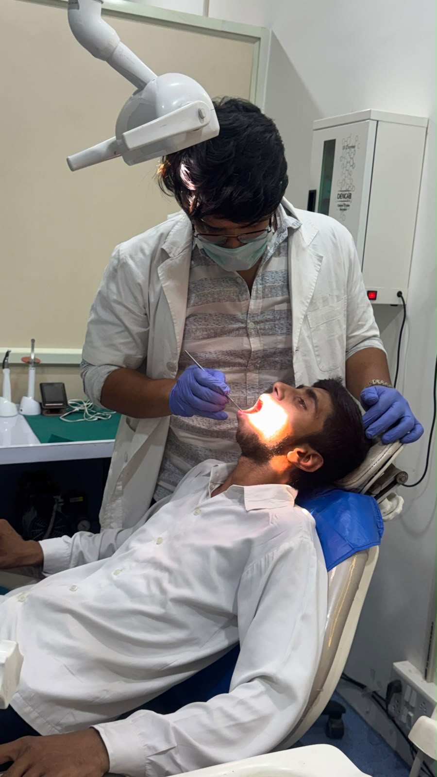 Dentist performing precise root canal treatment